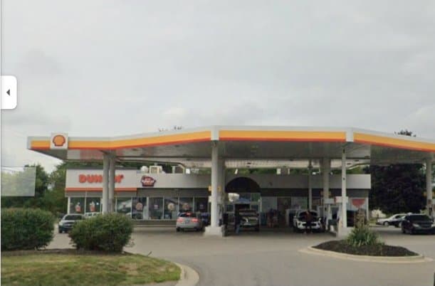 Kozy Oxford Shell canopy and storefront from the street.